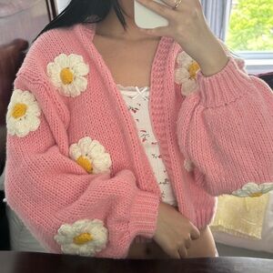 Pink cropped crochet cardigan with flowers